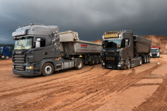 two_scania_at_site_parked